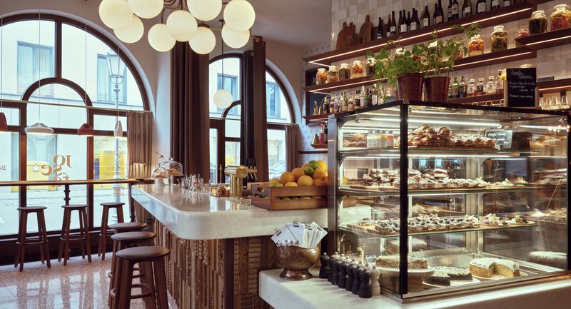 Café with pastry display in the Tagescafé